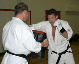 Sempai Leo pushes himself in hard fighting training.